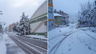 Bursa'nın Keles ilçesinde etkili olan kar yağışı nedeniyle ilçe beyaza